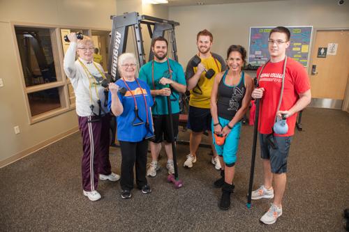 Pictured is a faculty-staff exercise group. Grand Valley received a state workplace fitness award.