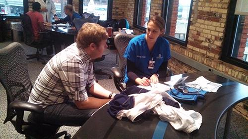 Students from the Kirkhof College of Nursing conducted a biometrics screening clinic at DoMoreGood in Grand Rapids.