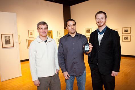 Jonathan Engelsma, Andres Solano and Nathan Kemler try out the new Art Gallery iPhone app