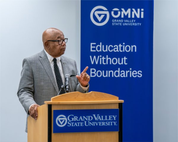 Joe Stewart, past GVSU Board of Trustees member, 
speaks at the DeVos Center for Interprofessional Health in Grand Rapids on Aug. 12. Starr Commonwealth has partnered with GVSU Omni.
