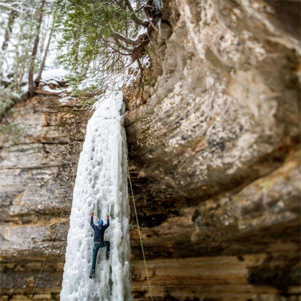 A student climbs a frozen waterfall during Ice Fest on February 15.