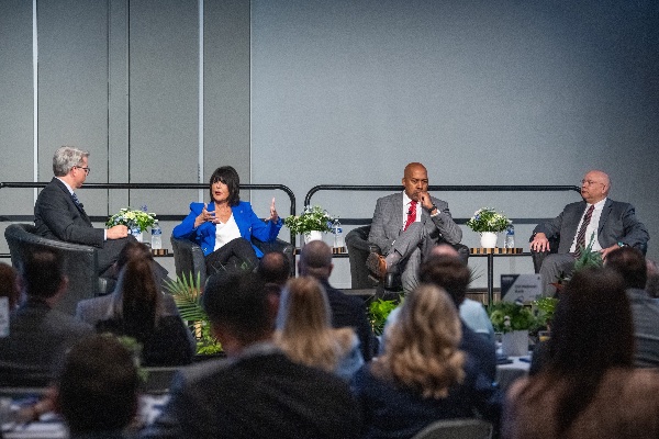 Grand Valley President Philomena V. Mantella answers a question from Crain's Executive Editor Mickey Ciokajlo during a panel discussion with Ferris State President Bill Pink and Grand Rapids Community College President Charles Pepper