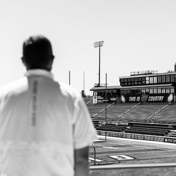 Head football coach Matt Mitchell looks at an empty Lubbers Stadium