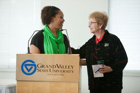 Chaunte Rodgers, left, chair of the Women's Commission, congratulates Cynthia Mader on receiving the Lifetime Achievement Award during the Celebrating Women Awards Ceremony March 13.