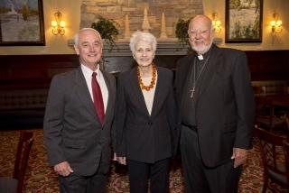 Douglas Kindschi, Sylvia Kaufman, and award recipient the Rev. Richard Rhem, pastor emeritus of Christ Community Church in Spring Lake.