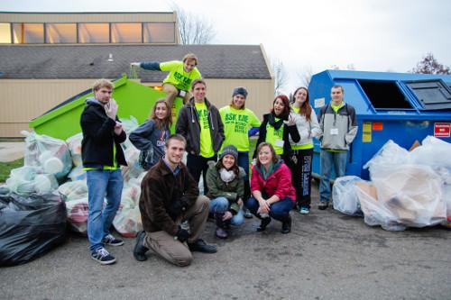 Members of the Student Environmental Coalition help recycle and compost materials at a football game last year.