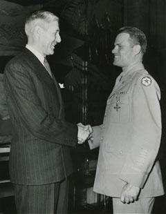 Ralph Hauenstein received the Order of the British Empire award for his service in World War II. This Associated Press photo was taken at the ceremony in 1947.