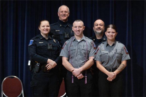 From left: Captain Leah Heaton, Chief Brandon DeHaan, Recruit Corey Robinson, Captain Kourosh Khatir and Recruit Isis Lett